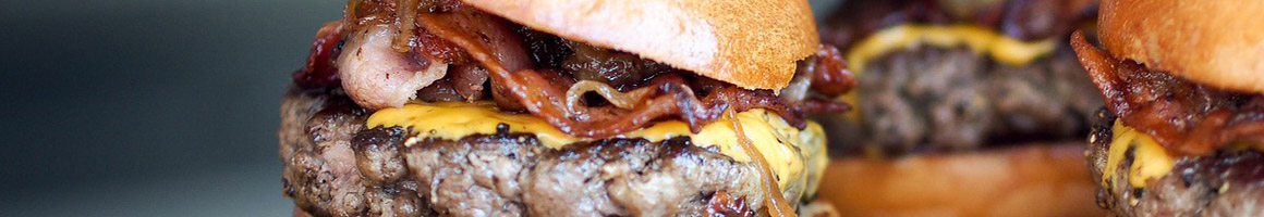 Eating Burger Hot Dog at Lee's Hamburgers restaurant in Metairie, LA.